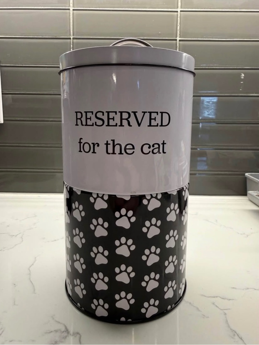 “Reserved for the cat” treat holder